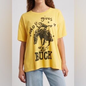 Daydreamer Who Gives A Buck Merch Tee in Yellow Gold